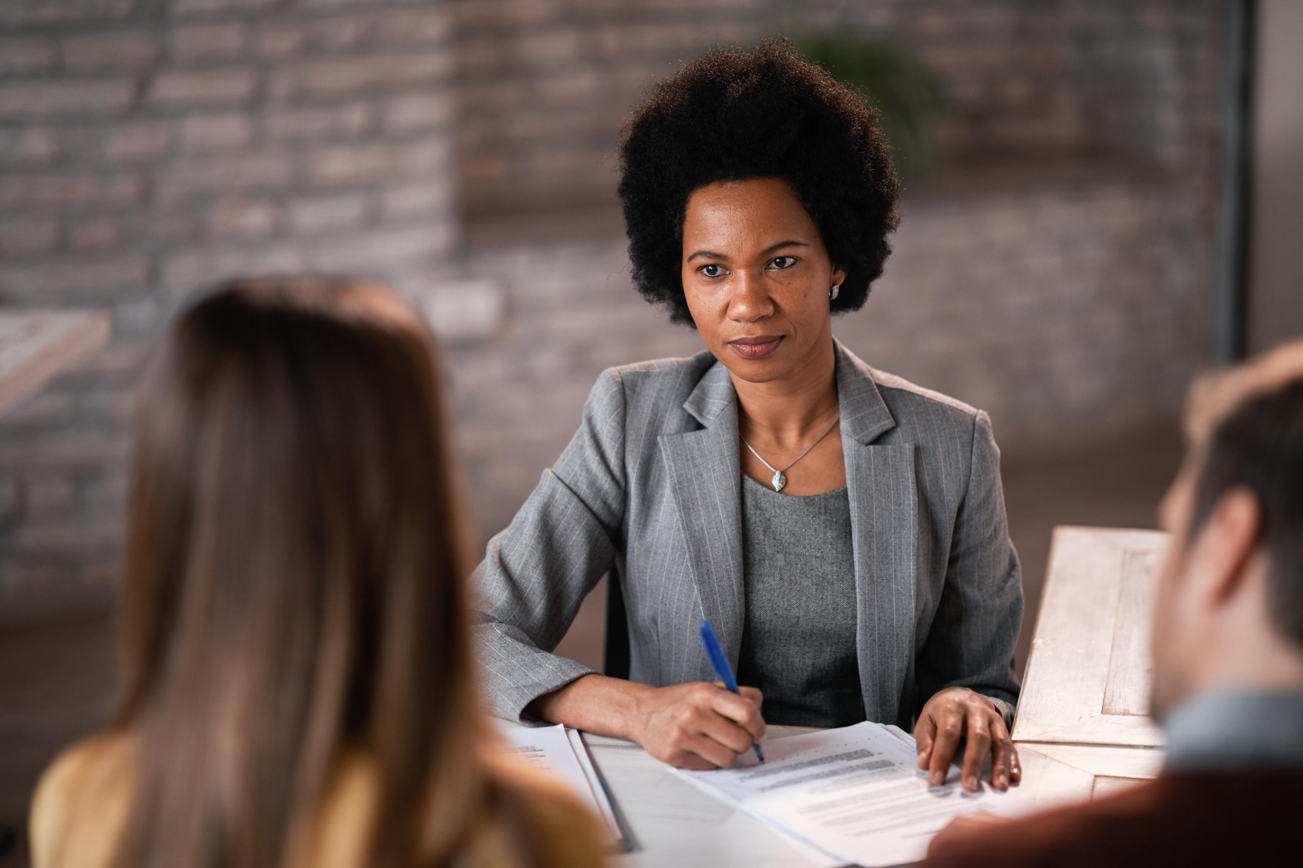 african women signing business contracts company registration