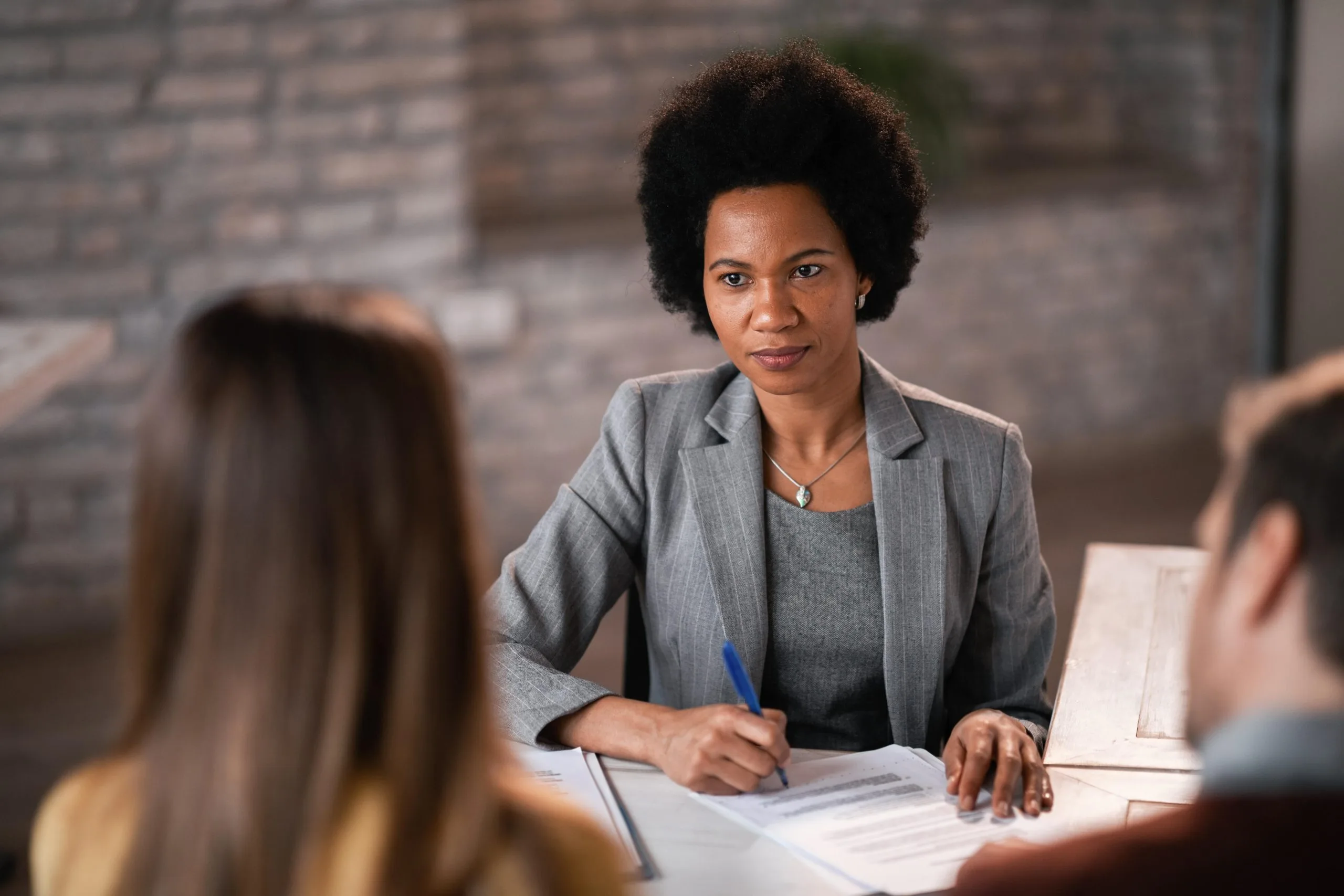 african women signing business contracts company registration